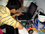 Chinese middle school student getting ready for a robotics contest. Photo: Otto Kölbl, Xi'an, 2005.