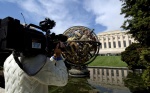 A TV reporter in front of the United Nations Office in Geneva. Photo: UN.